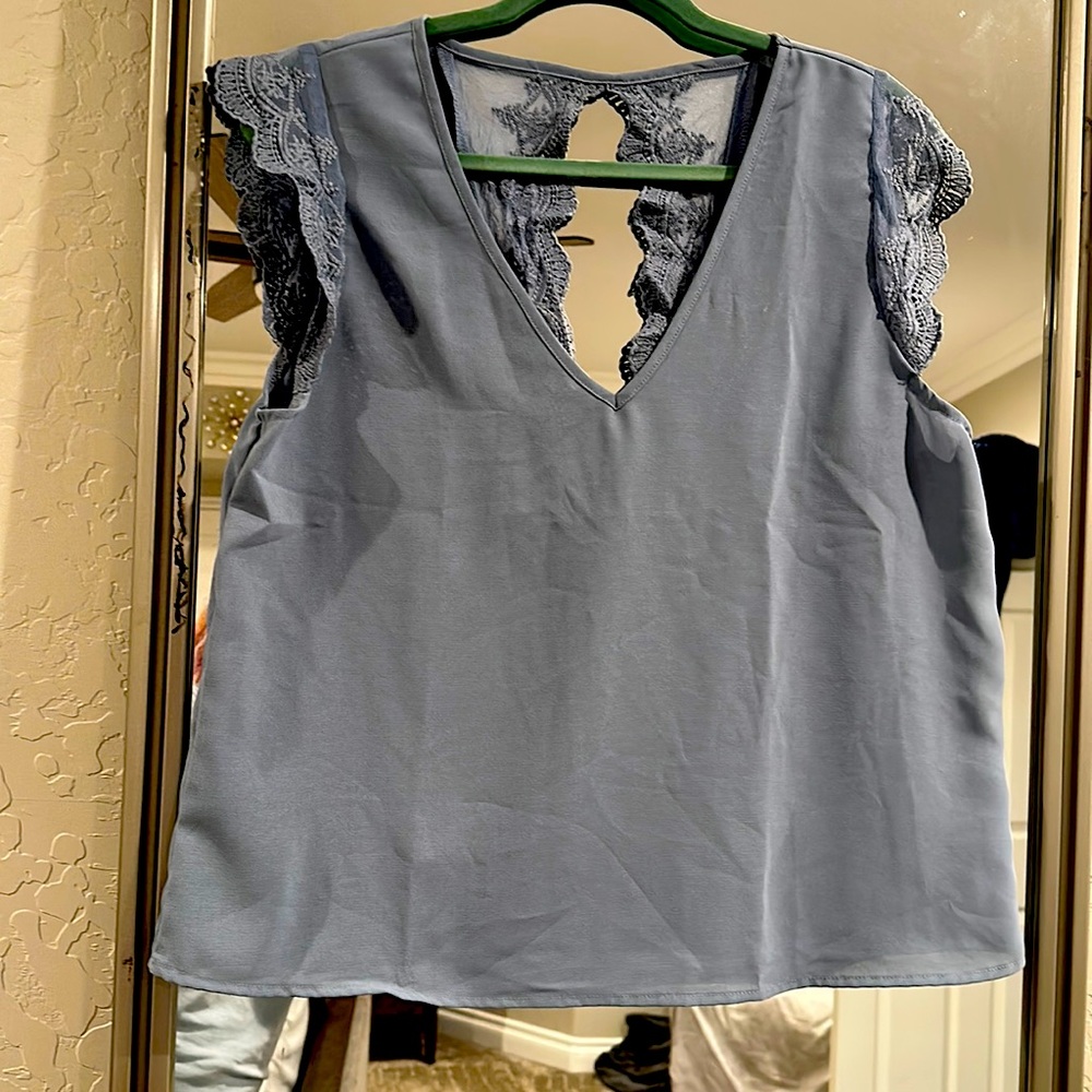 Woman’s blue blouse